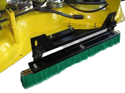 Green brush attachment mounted on yellow John Deere EZtrak mower deck for John Deere Parts & Accessories collection