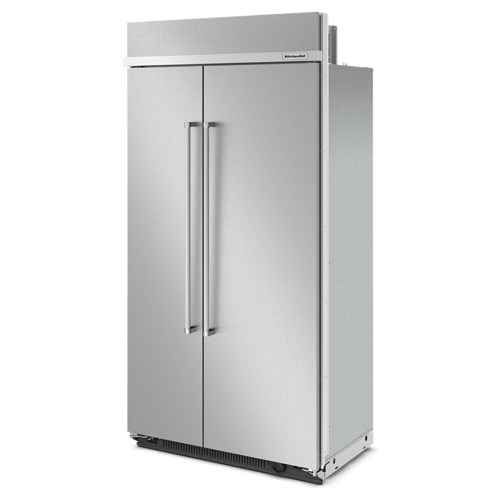 Stainless steel built-in side-by-side refrigerator with tall handles and PrintShield™ Finish from KitchenAid appliances collection