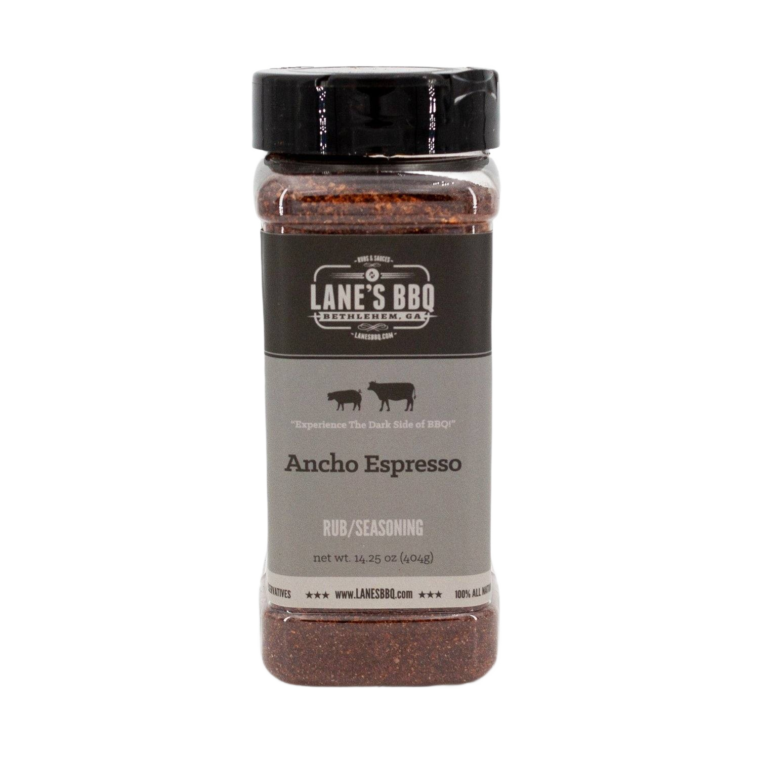 Clear plastic spice jar filled with dark Ancho Espresso BBQ rub seasoning and black screw-on lid