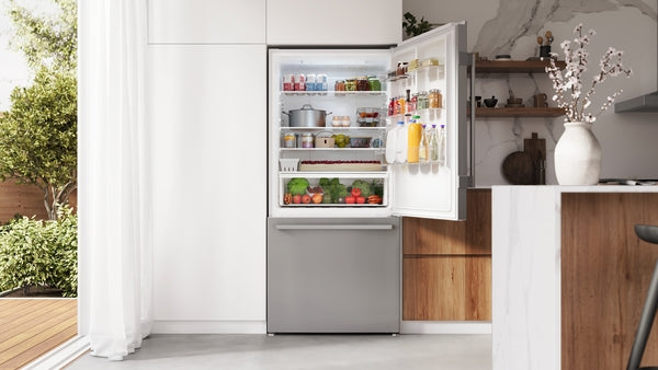 Freestanding stainless steel bottom freezer refrigerator with anti-fingerprint finish in Bosch kitchenware collection