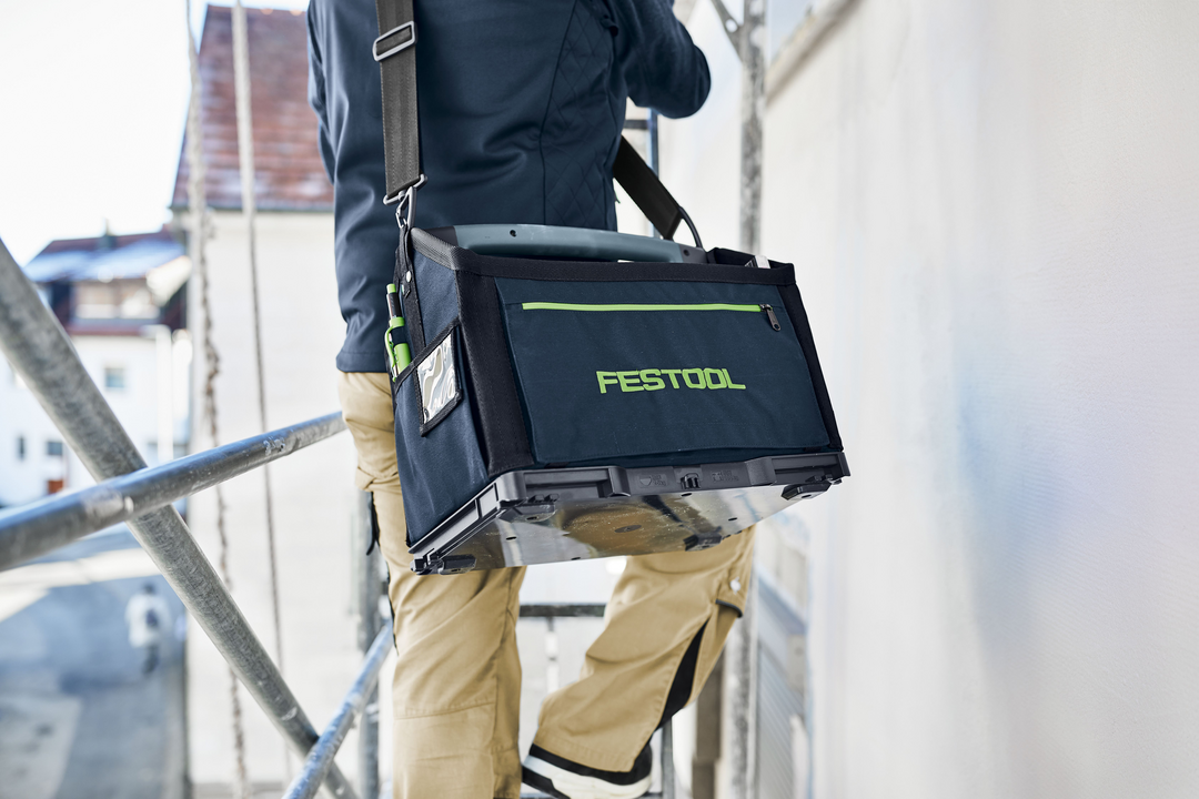 Compact black and green Festool tool bag with handle and strap for workshop and jobsite tool storage organization