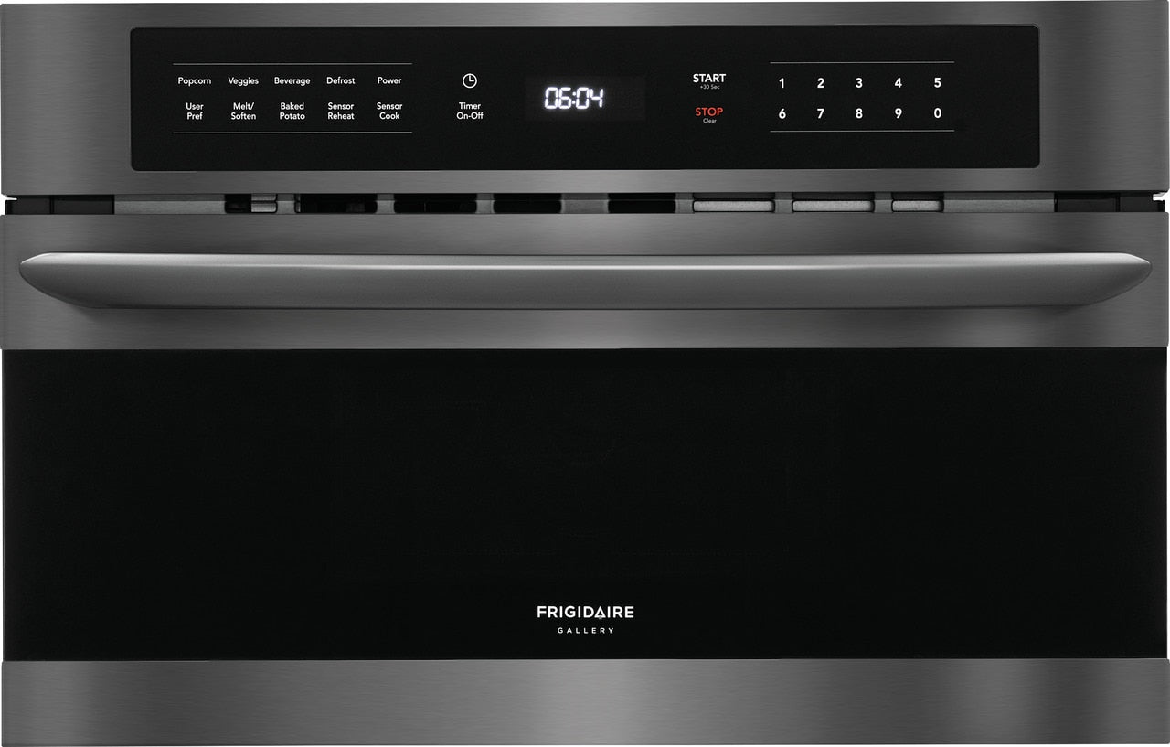 Stainless steel built-in microwave oven with drop-down door and digital control panel in kitchen appliances collection