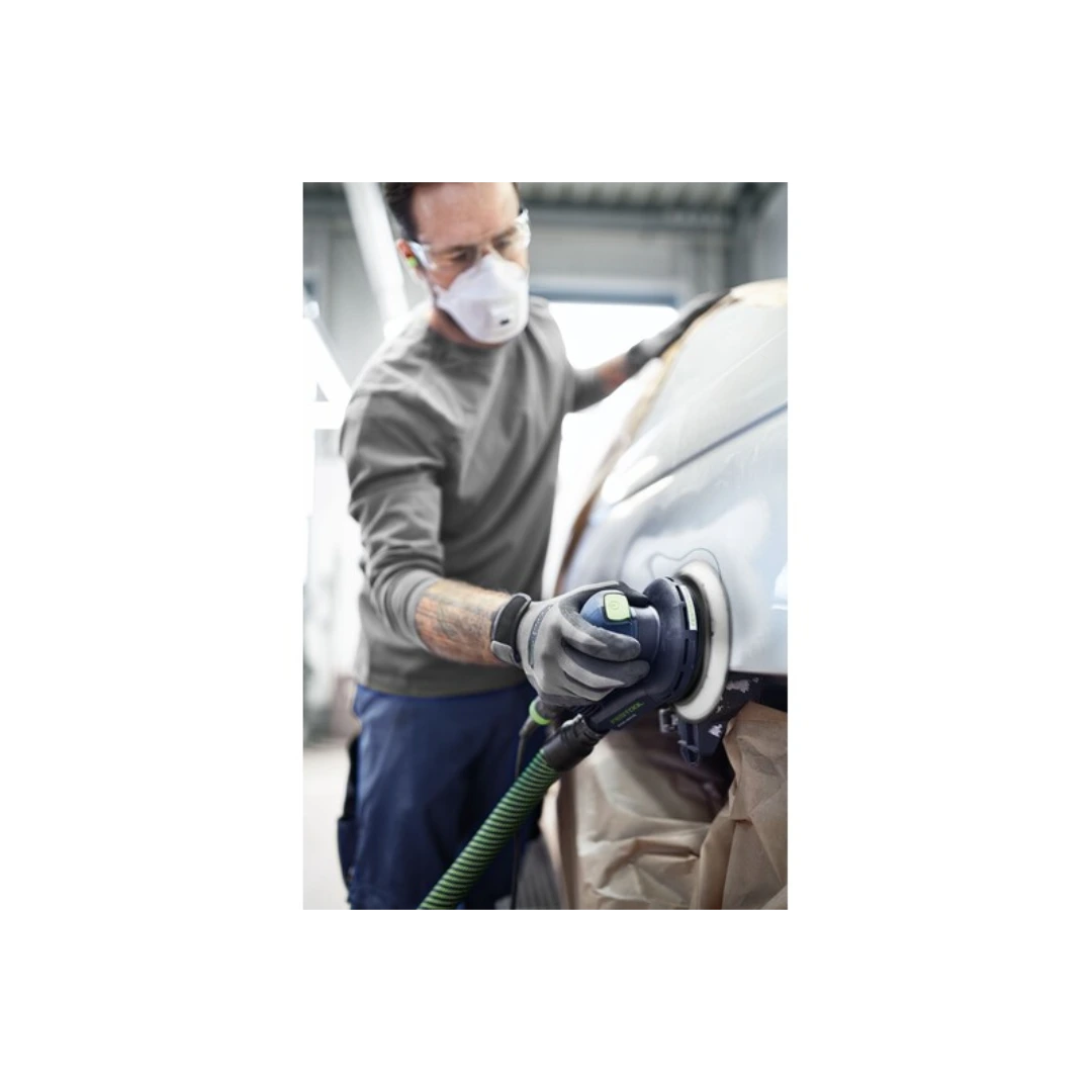 Technician wearing safety gear using a supersoft sanding pad on a vehicle surface in woodworking tool accessories collection
