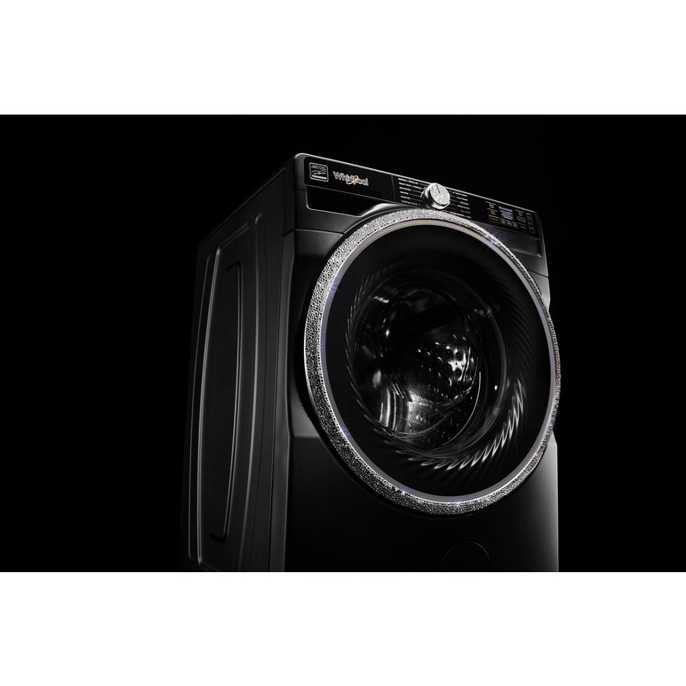 Black front load washer with illuminated door ring and visible stainless steel drum from washers and dryers collection