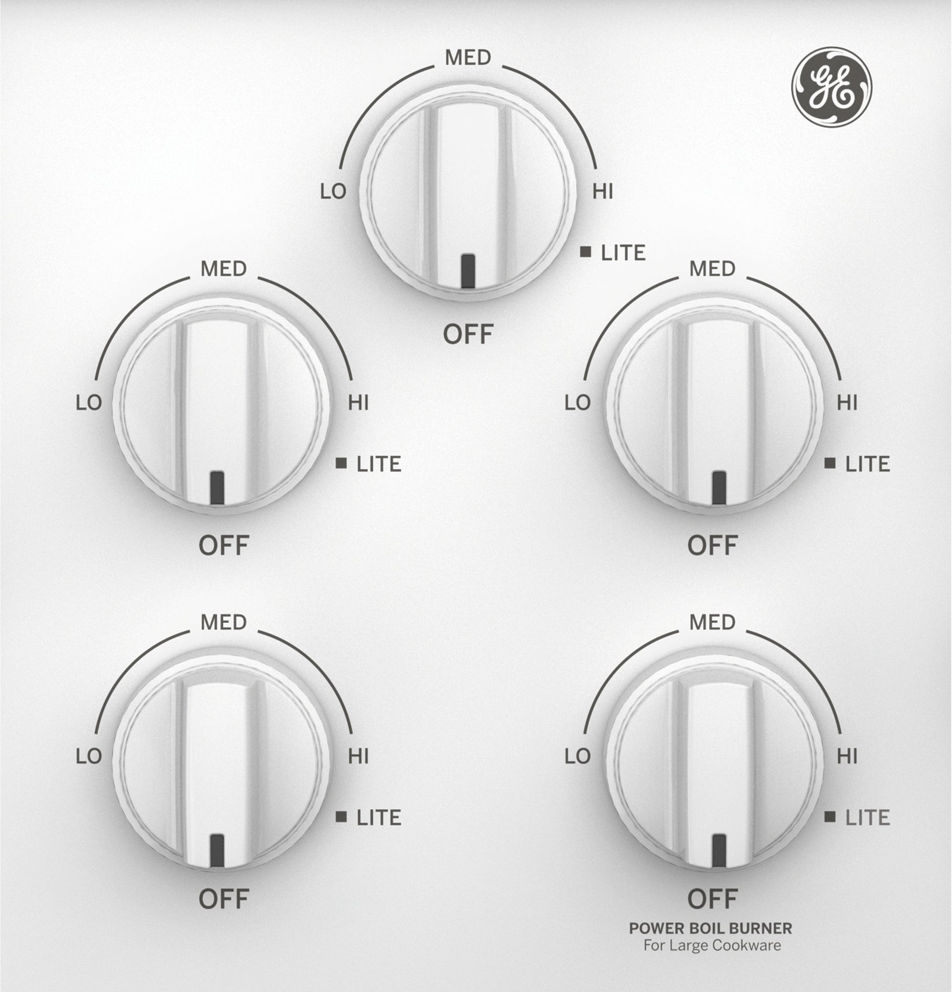 Close-up of white gas cooktop control panel with five knobs and GE logo from kitchen appliances collection