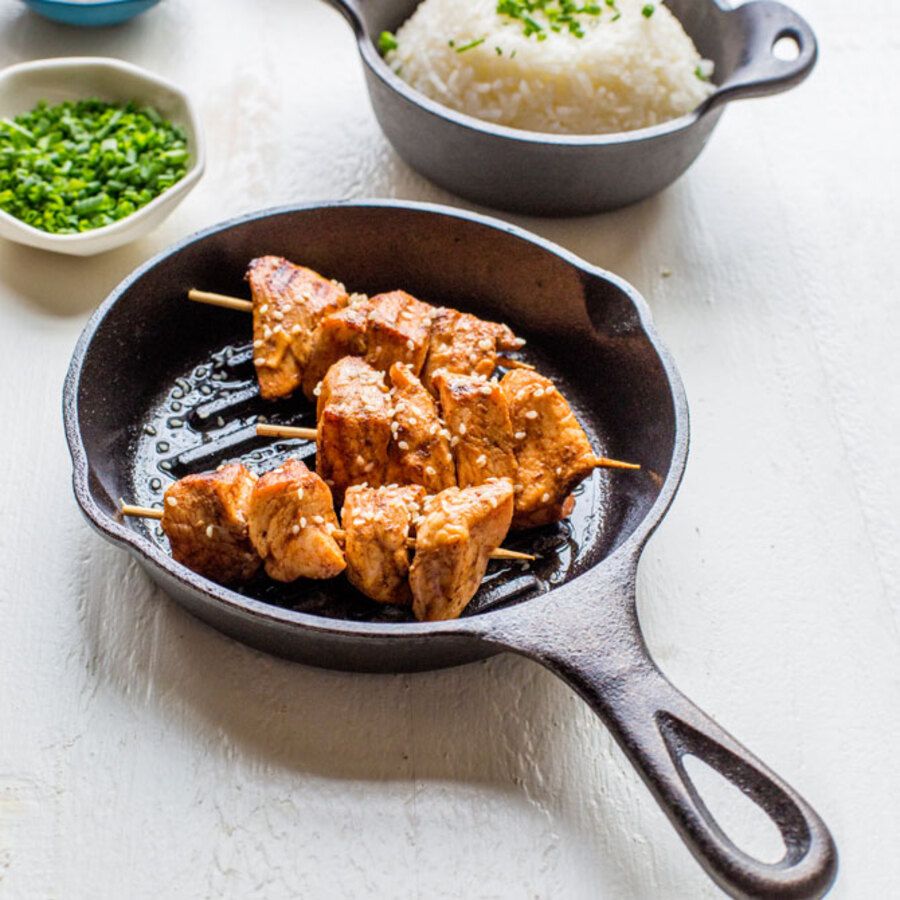 6.5 inch cast iron grill pan with skewered grilled meat served alongside rice and chopped herbs in kitchenware collection under $50