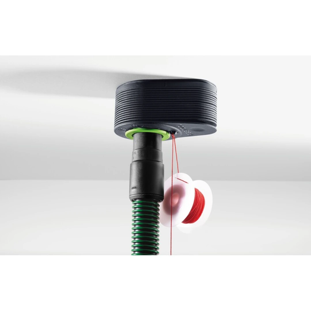 Close-up of Festool accessory mounted on ceiling with green vacuum hose and red string for woodworking dust management