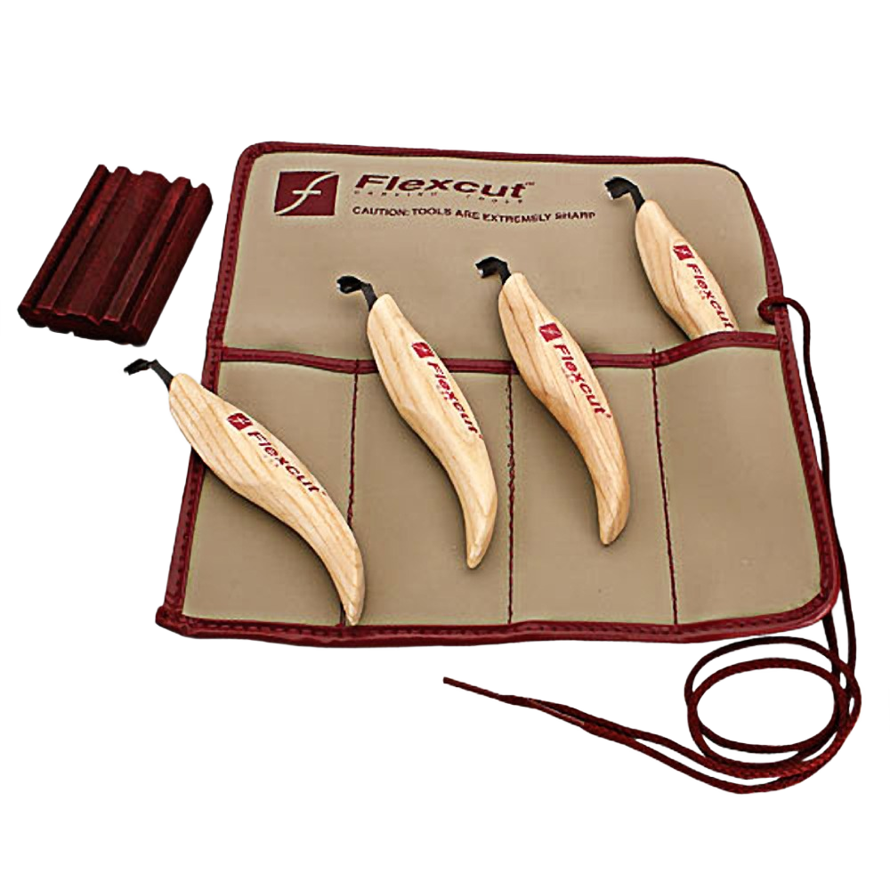 Set of four right-angled carving gouges with wooden handles in a tan fabric roll for woodworking and hand tool collections