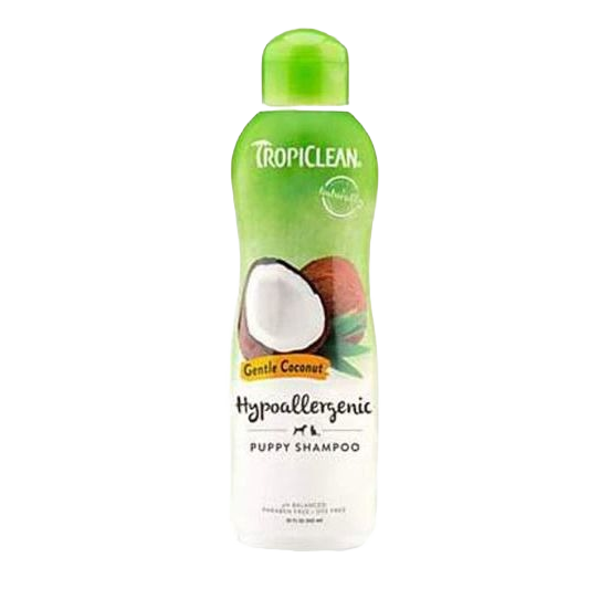 Bottle of TropiClean coconut hypoallergenic puppy shampoo for sensitive pet skin in health and grooming supplies