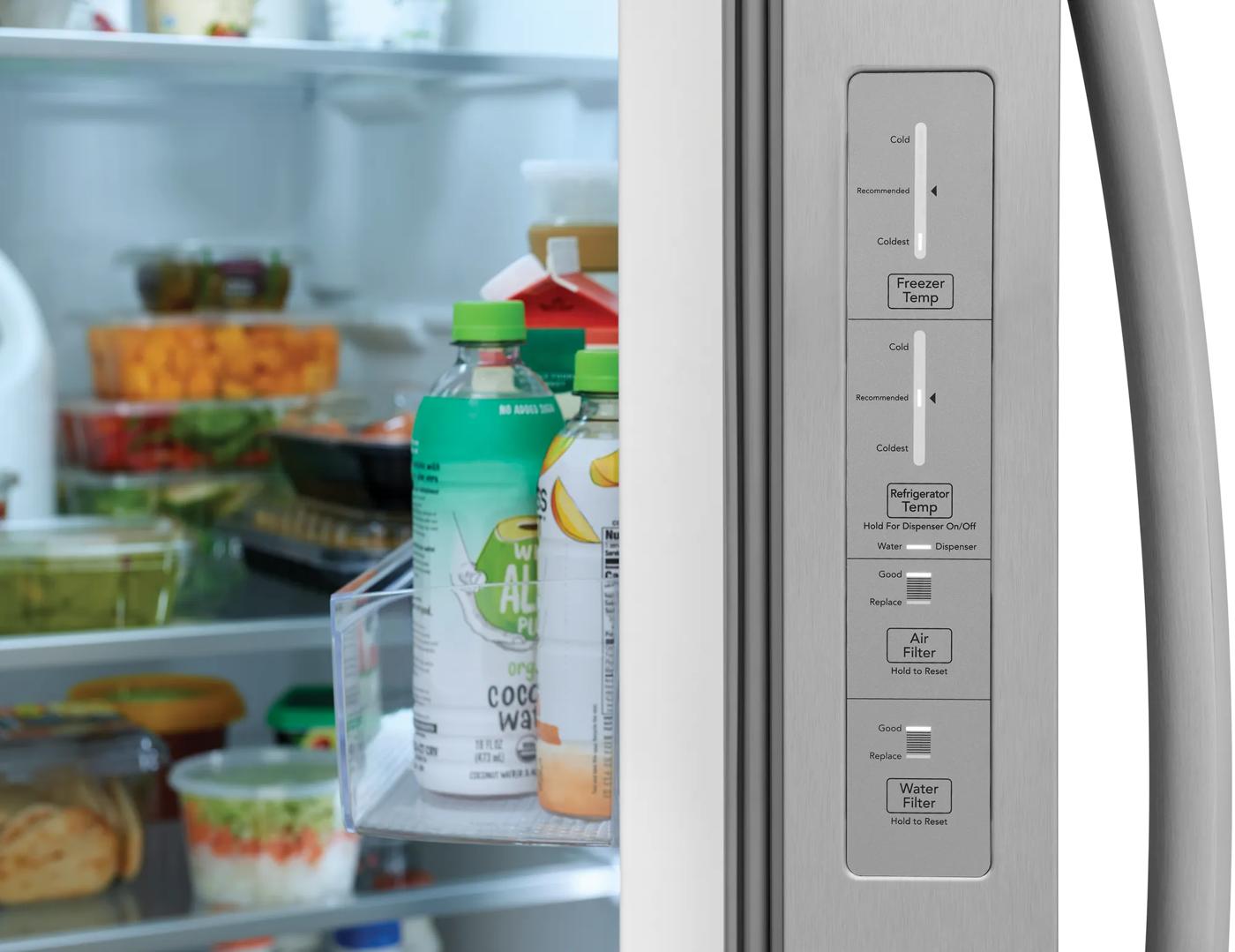 Close-up of side-by-side refrigerator door with temperature controls and water filter indicator from Appliances collection