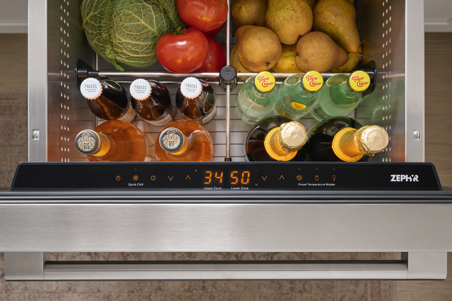 Under-counter stainless steel dual zone refrigerator drawer with beverages and fresh produce in kitchen appliances collection