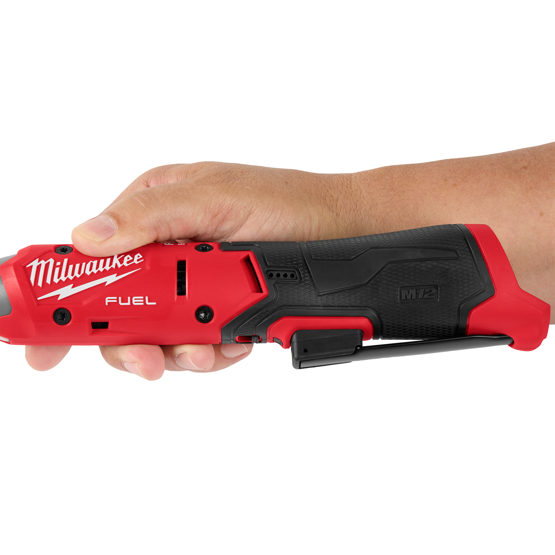 Hand gripping the red and black Milwaukee M12 FUEL cordless ratchet with ergonomic handle and belt clip, part of Milwaukee hand tools at Hartville Hardware for home improvement and woodworking.