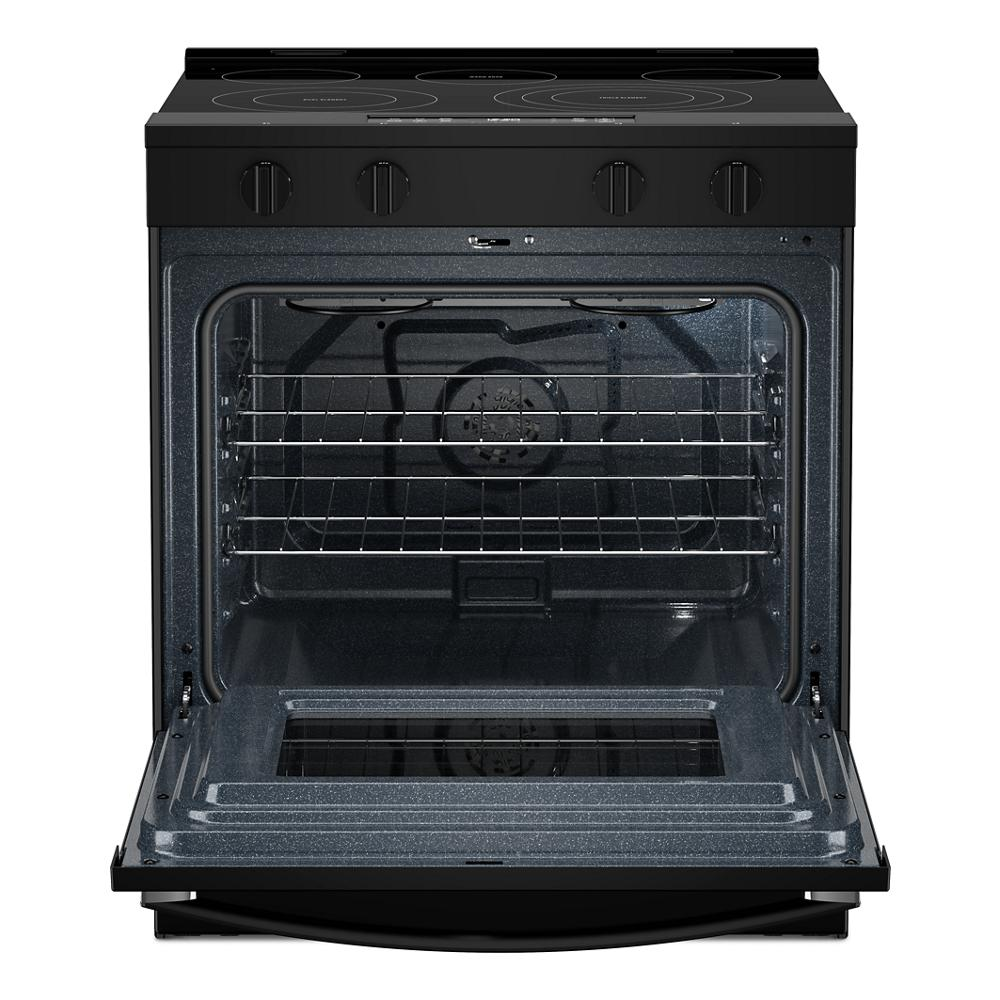 Open front view of black electric range showing spacious oven interior and two wire racks in kitchen appliances collection
