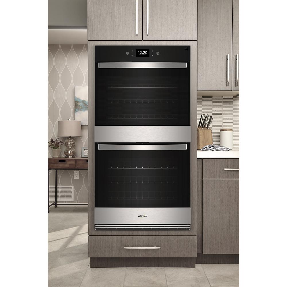 built-in stainless steel double wall oven with digital display in modern kitchen appliances and home improvement