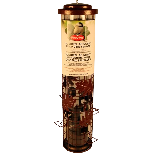Tall cylindrical bird feeder with metal pinecone and leaf design to deter squirrels from feeding.