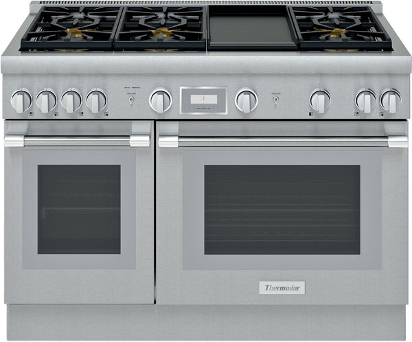 large stainless steel gas range with dual ovens, multiple burners, and central control knobs in kitchen appliances collection