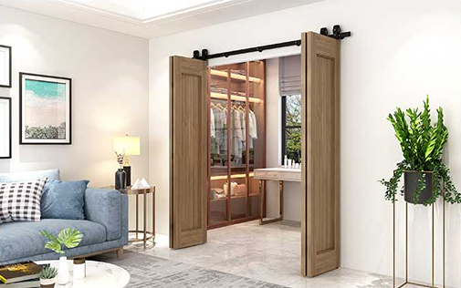 Black flat track hardware mounted for smooth sliding operation of wooden bi-fold doors in stylish residential interior