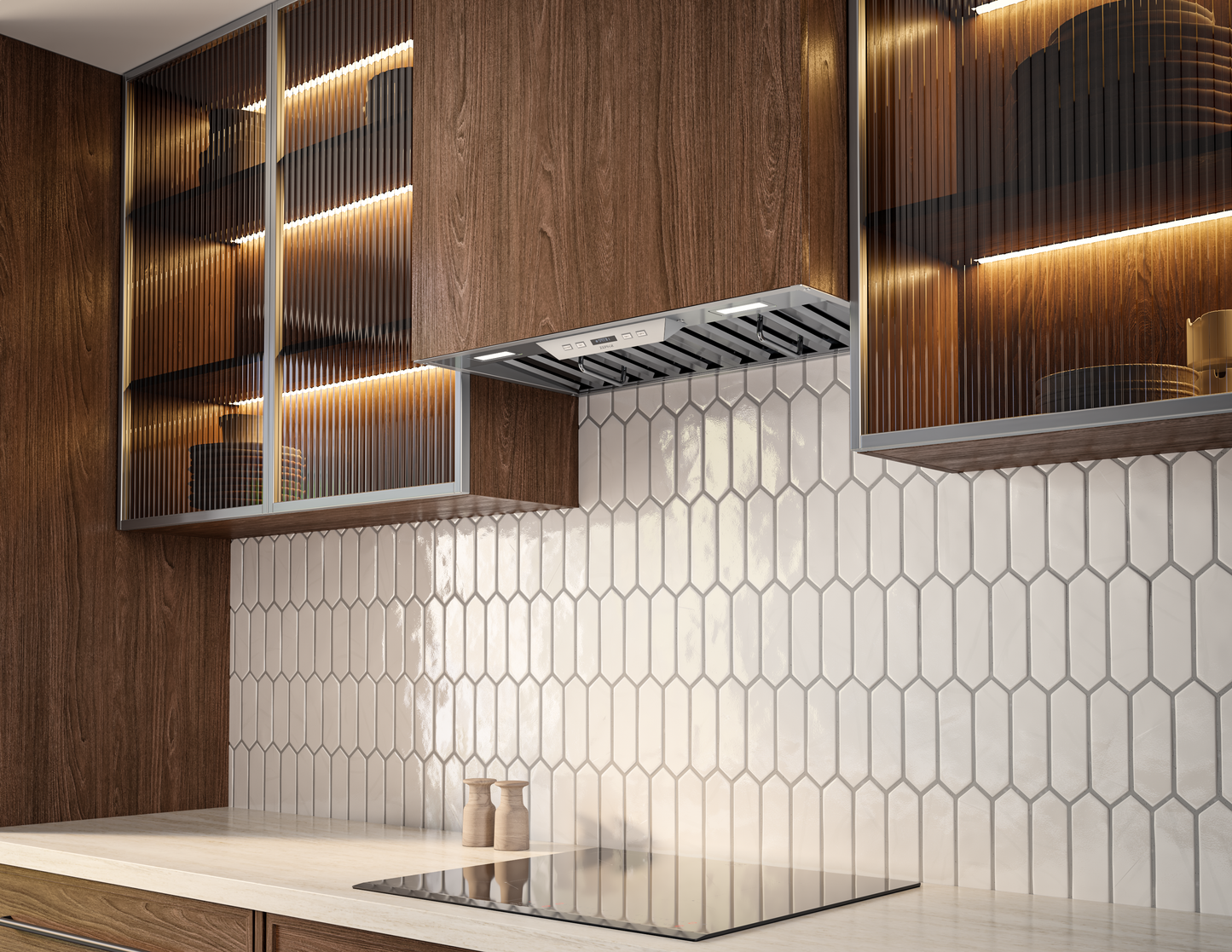 Sleek stainless steel range hood insert with pro baffle filters installed under walnut cabinets in modern kitchen setting