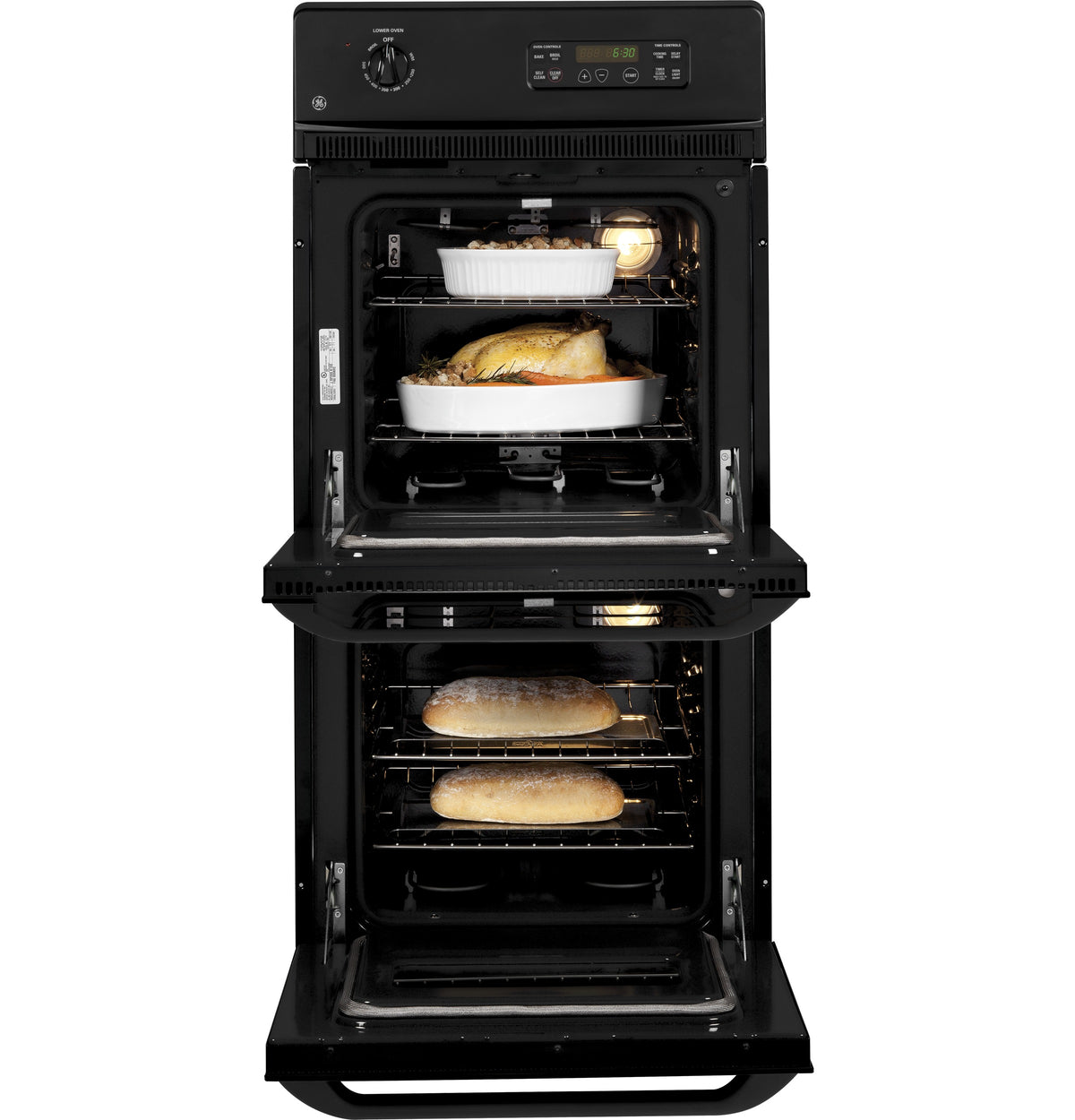 Open black double wall oven with baked turkey and bread inside from kitchen appliances collection