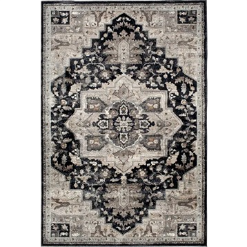 Tan and black patterned rug with intricate central medallion design for home decor and improvement use