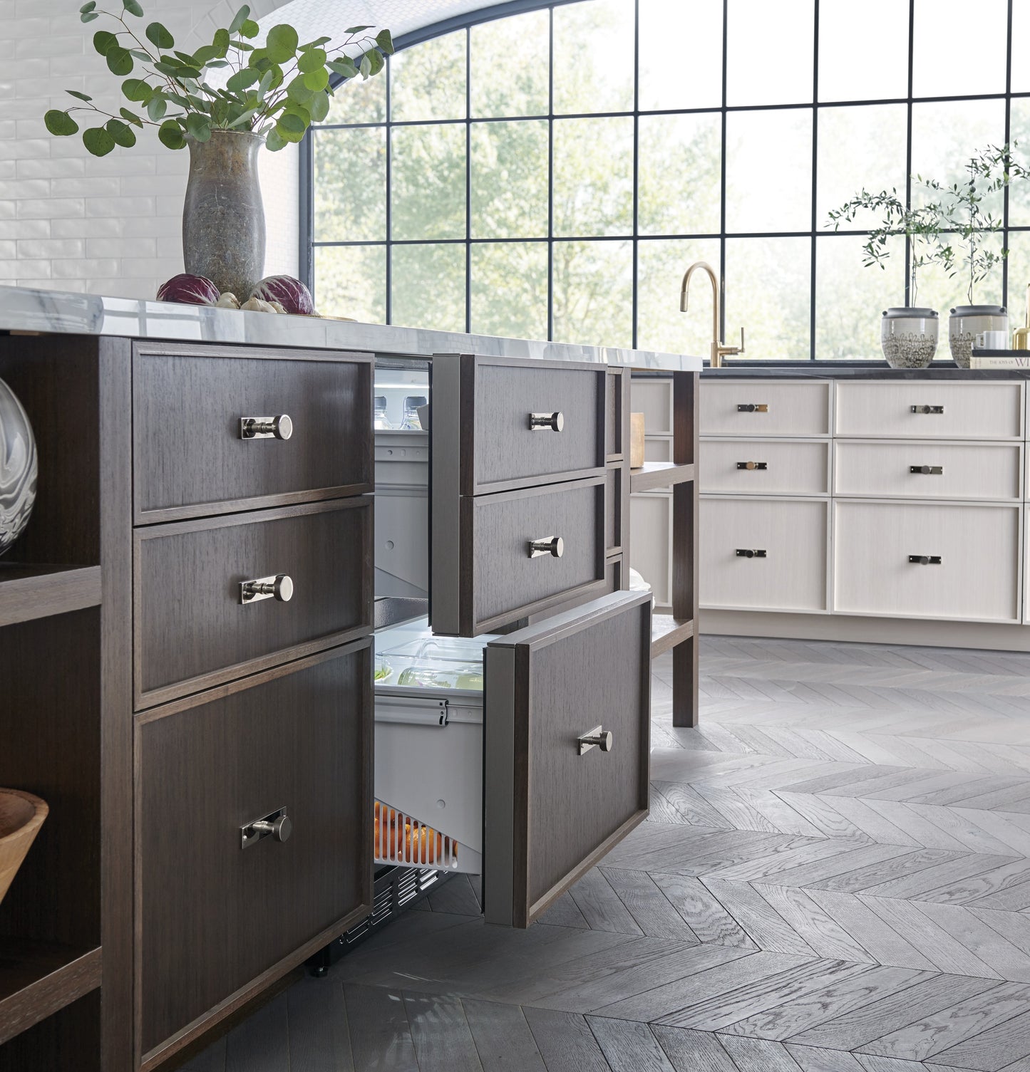 Dark wood panel-ready double-drawer refrigerator integrated into kitchen cabinetry, part of Refrigerators and Appliances collection