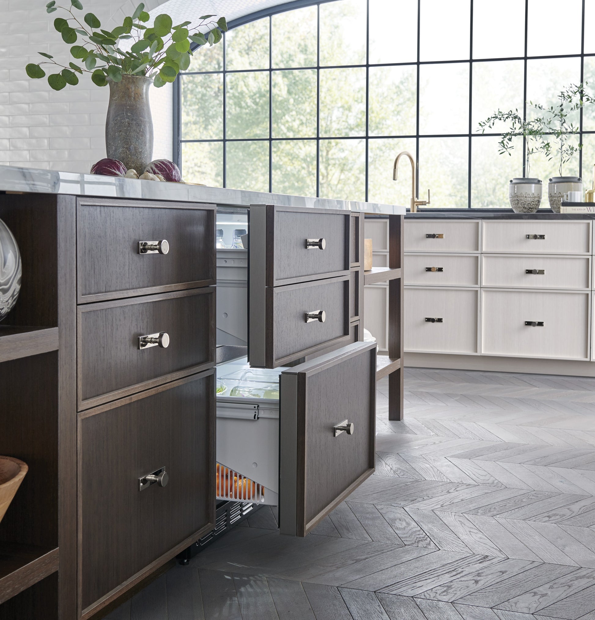 Dark wood panel-ready double-drawer refrigerator integrated into kitchen cabinetry, part of Refrigerators and Appliances collection