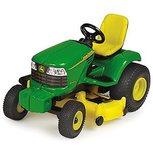 Green and yellow ride-on lawn tractor toy with black steering wheel and detailed tire tread pattern