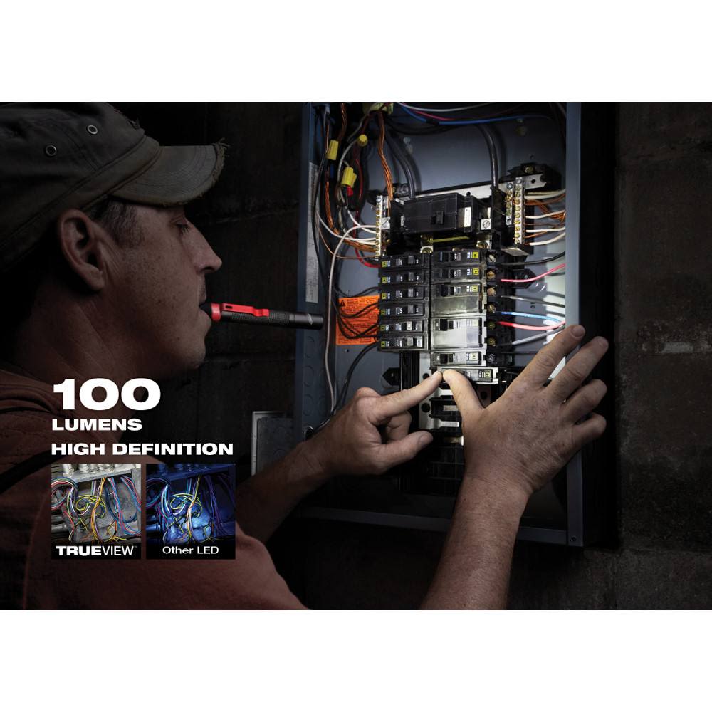 Electrician using red and black 100-lumen penlight to inspect wiring inside electrical breaker panel at night