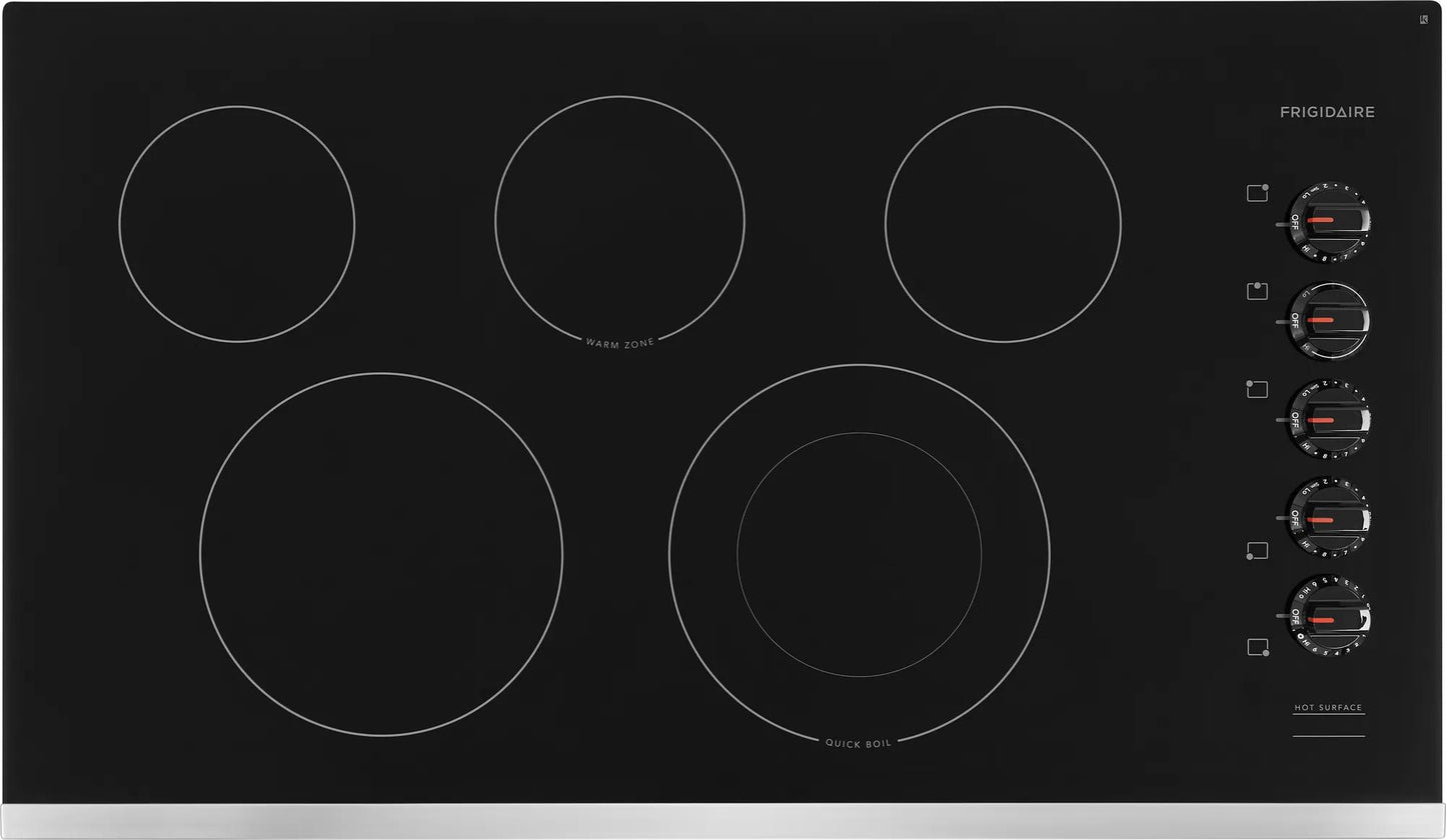 Black electric cooktop with five heating elements and right-side control knobs from kitchen appliances collection