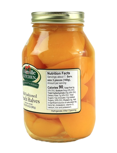 Glass jar of Hartville Kitchen old fashioned peach halves packed in natural syrup for jams and jellies collection