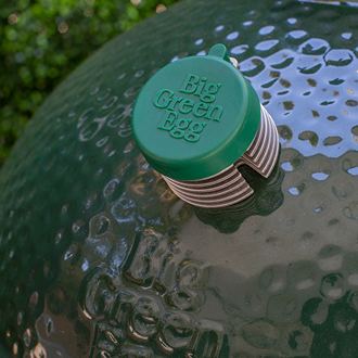 Green Bluetooth dome thermometer with protective cap for outdoor grilling and Big Green Egg accessories collections