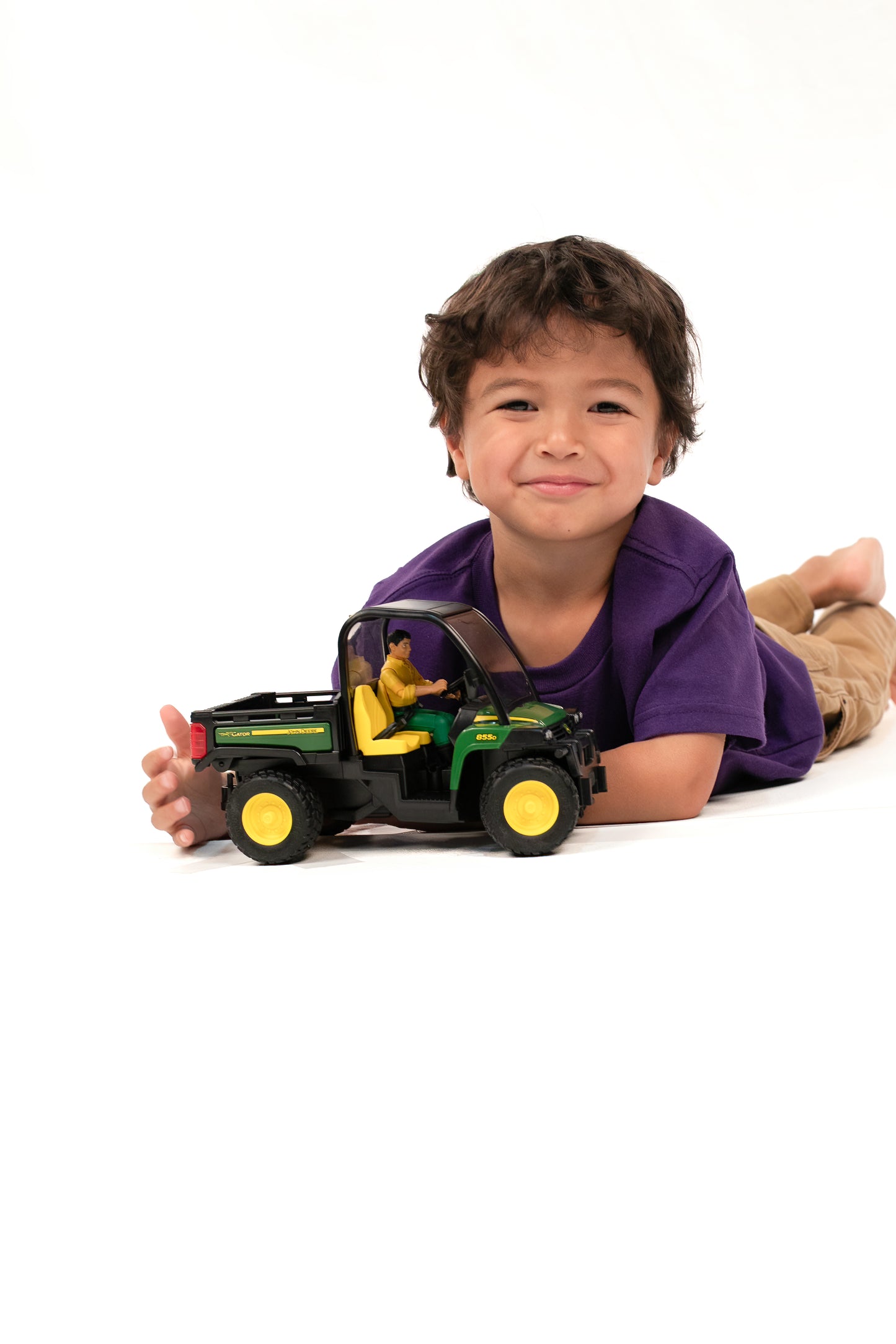 Child playing with Bruder Toys John Deere Gator XUV 855D with Driver from Vehicles & Remote Controlled Toys collection