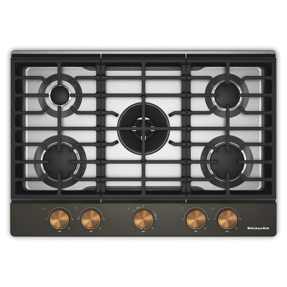 Top view of a gas cooktop with five burners, featuring an integrated wok grate and bronze-toned weighted knobs, part of Cooktops, Gas Cooktops, Kitchen & Kitchenware, All Products, KitchenAid, Appliances, Ranges & Cooktops collections.