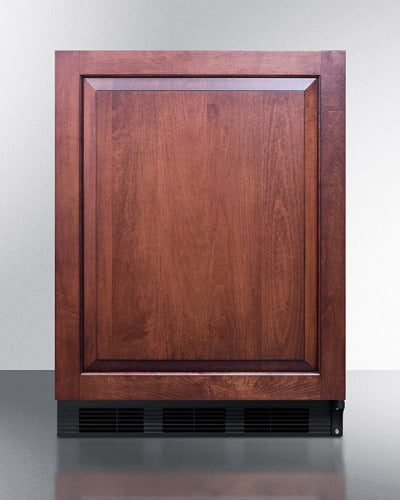 Built-in refrigerator-freezer with reversible wood panel door and front ventilation in kitchen and appliances collection