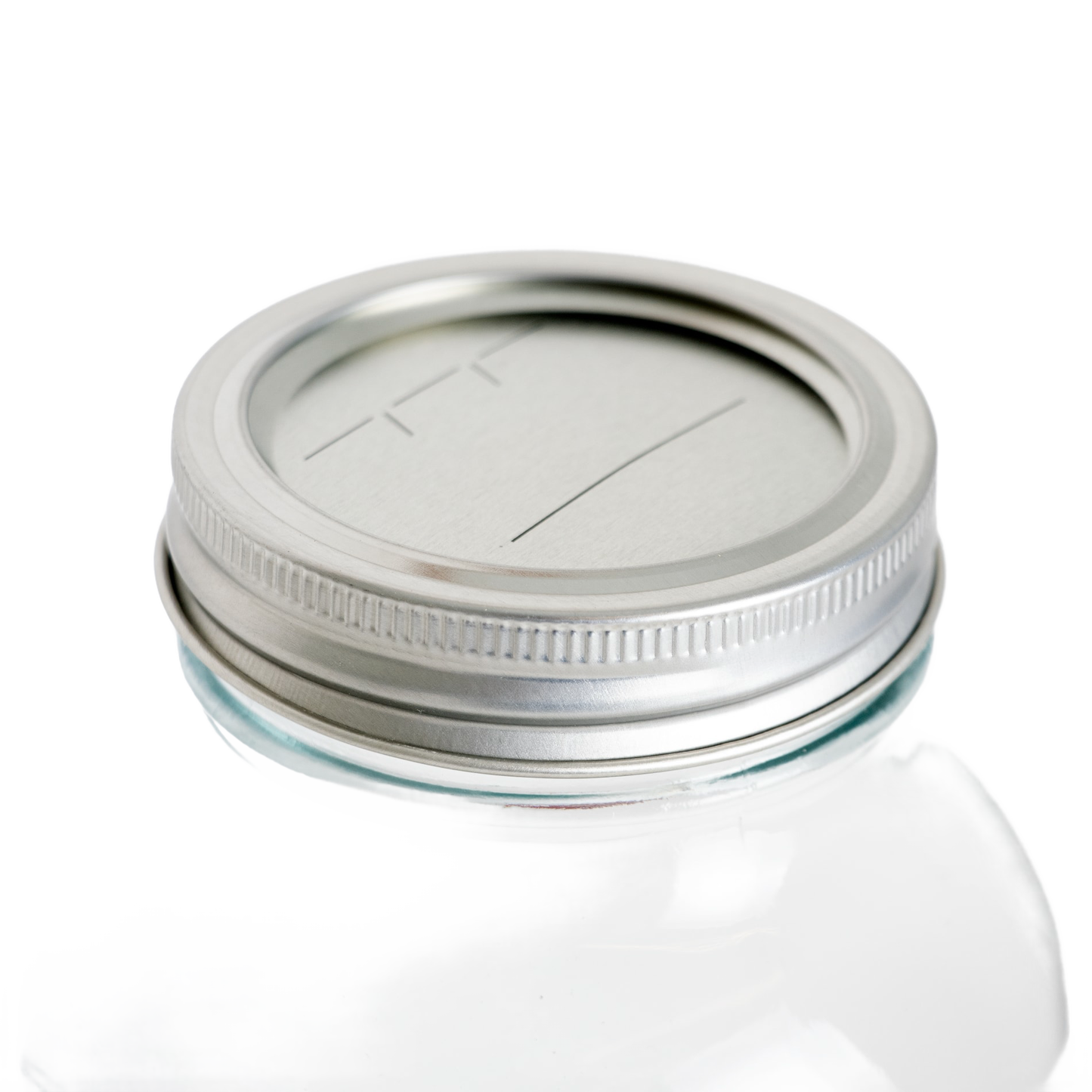 Silver-tone regular-mouth canning lid and band with date marking lines on glass jar in kitchenware under $25 collection