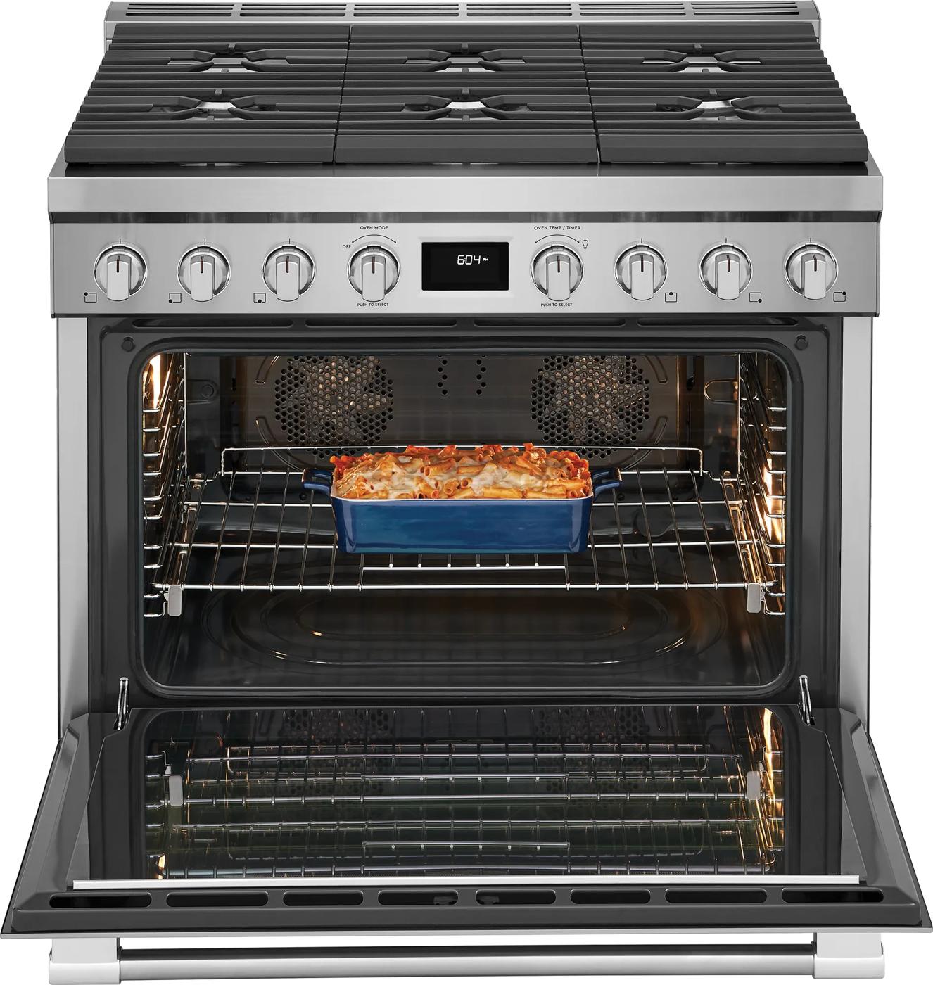 Stainless steel dual-fuel range open oven with convection fans baking casserole from Ranges collection