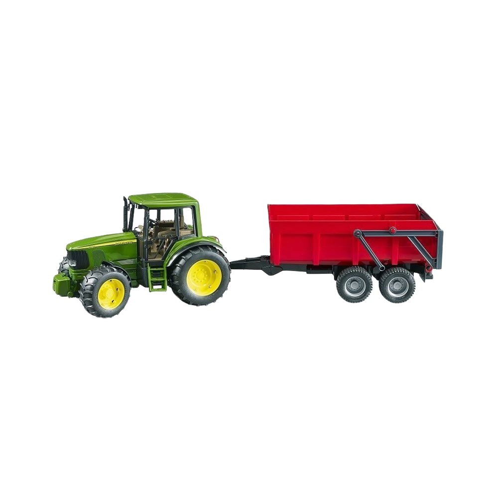 Green toy tractor with yellow wheels attached to a red tipping trailer for farm play and model collection