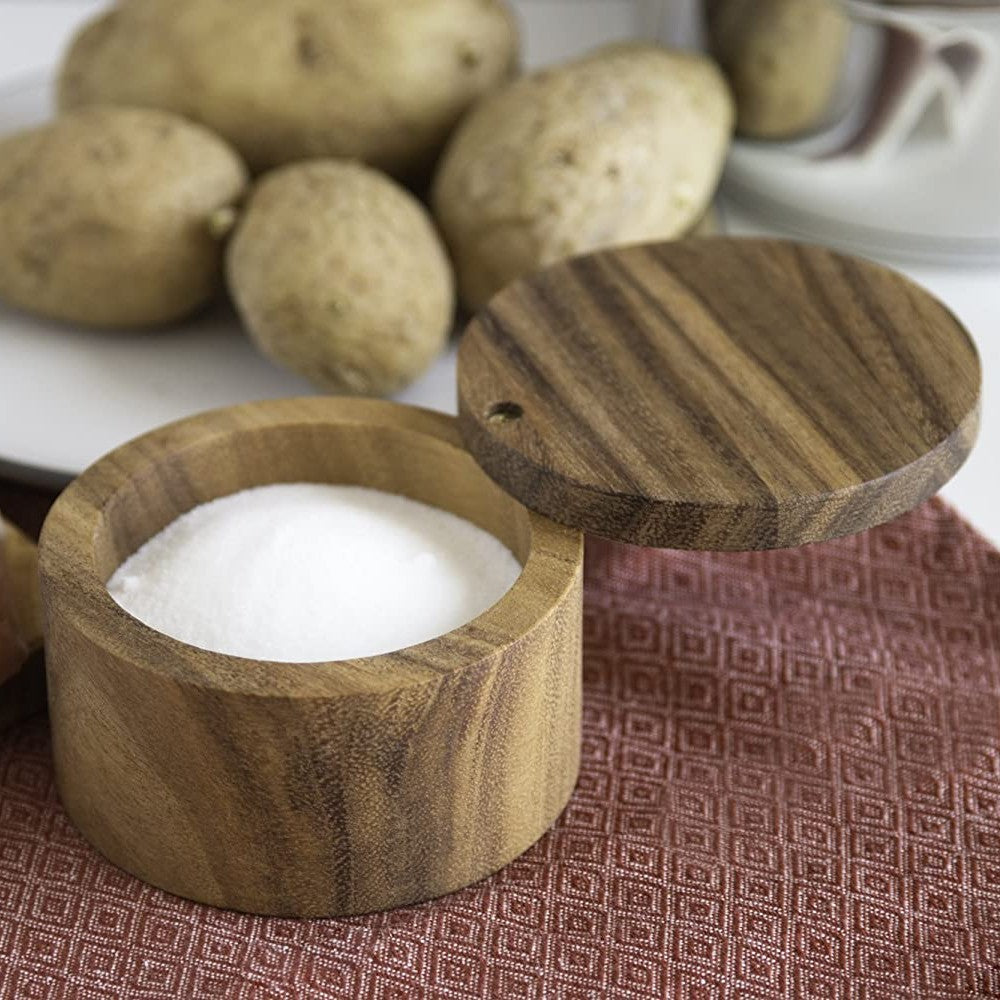 Round acacia wood salt cellar with hinged lid holding salt, kitchenware accessory from Cooking Utensils and Under $50 collections