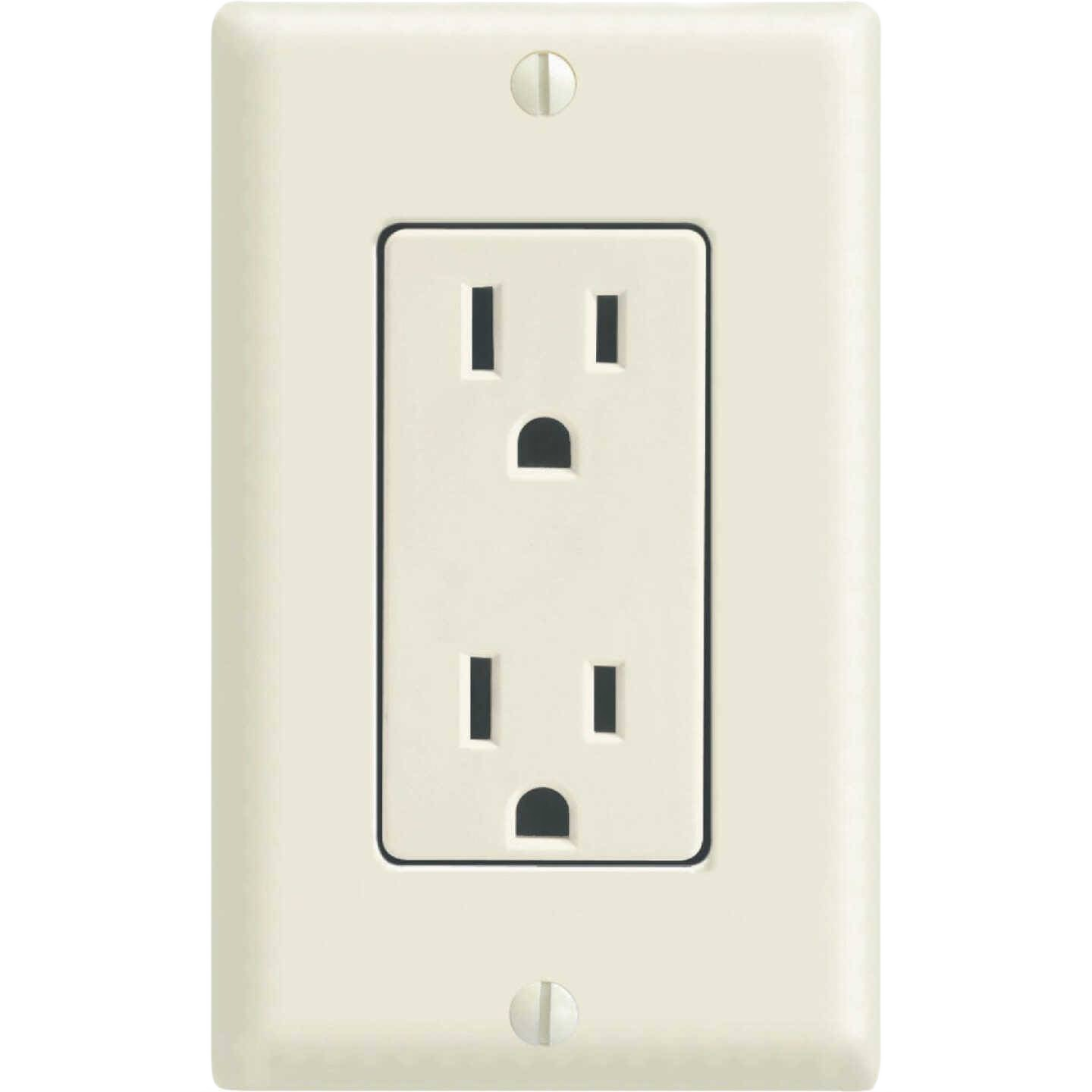 Light almond duplex electrical outlet with wall plate for residential home improvement and tools use