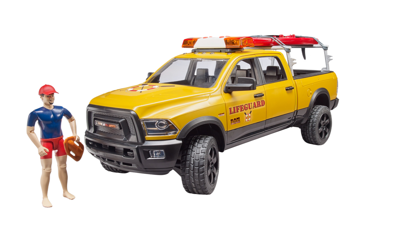 Yellow lifeguard-themed RAM 2500 toy truck with rescue accessories and lifeguard figure from Bruder Toys collection