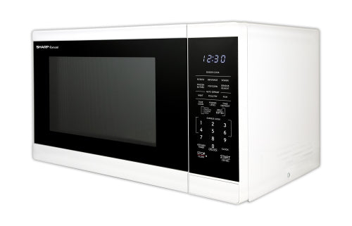 White Sharp countertop microwave oven with digital keypad and LED clock display from microwaves collection