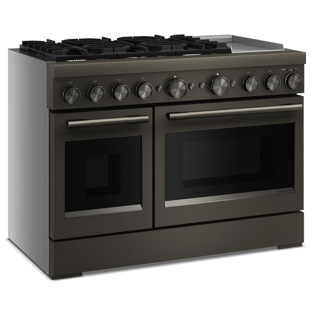 Angled view of 48-inch commercial-style dual fuel range with six burners, electric griddle, and dual ovens in appliance setting