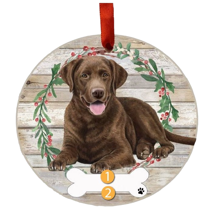 Round wooden Christmas ornament featuring a Chocolate Labrador lying in a wreath with red berries and green leaves.