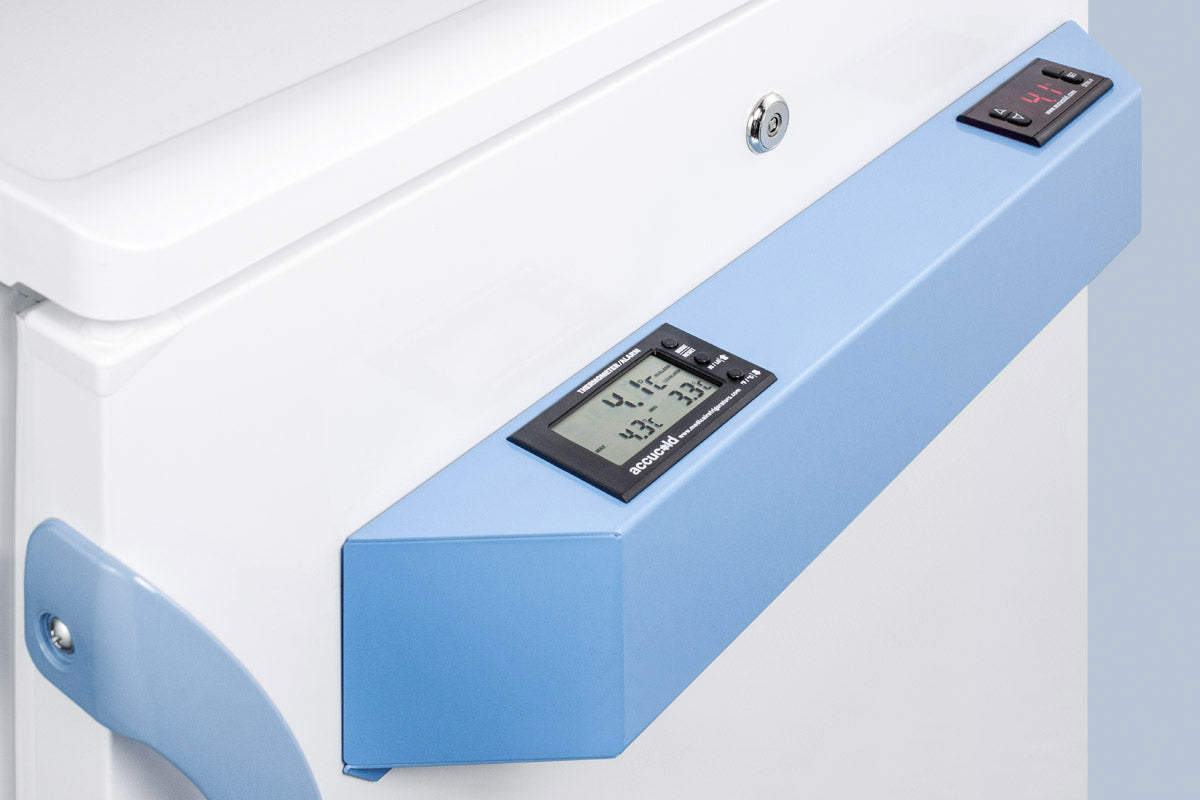 Close-up of medical-grade white refrigerator with blue control panel displaying temperature in laboratory appliance setting