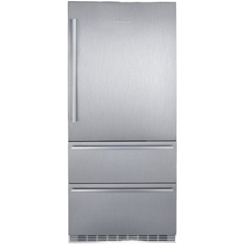 Built-in stainless steel fridge-freezer with bottom freezer drawers in modern kitchen appliance setting