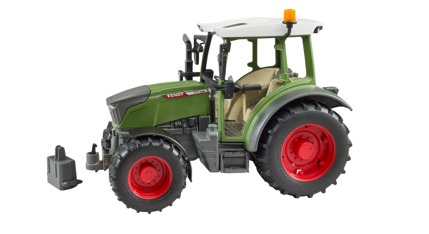 Green and red Bruder tractor model with detailed tires and cabin, designed for tools and home improvement enthusiasts