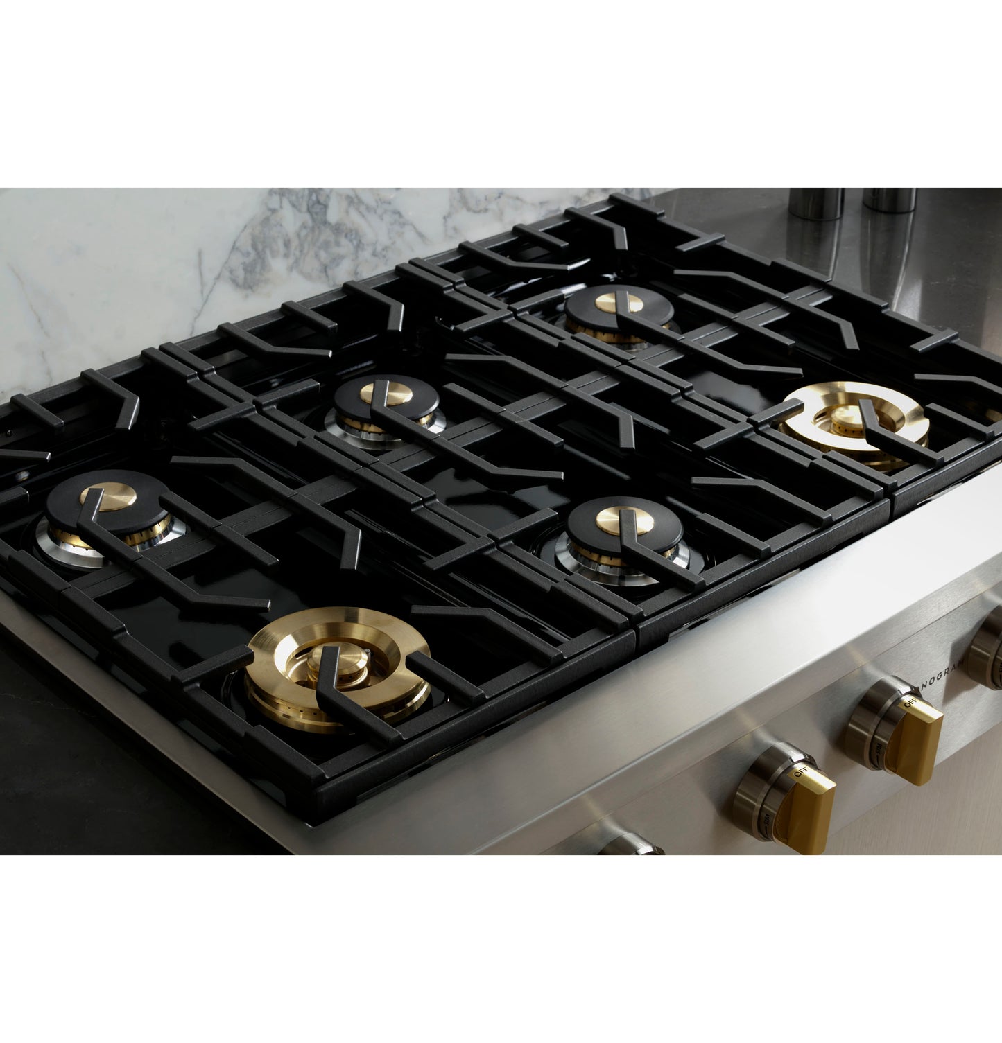 Stainless steel cooktop with six burners and brass knobs, part of Cooktops and Kitchen & Kitchenware collections