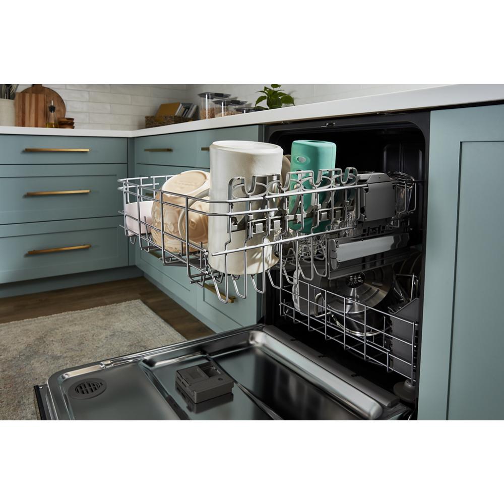 Open dishwasher with adjustable upper rack loaded with coffee mugs and kitchenware in kitchen and appliances collection