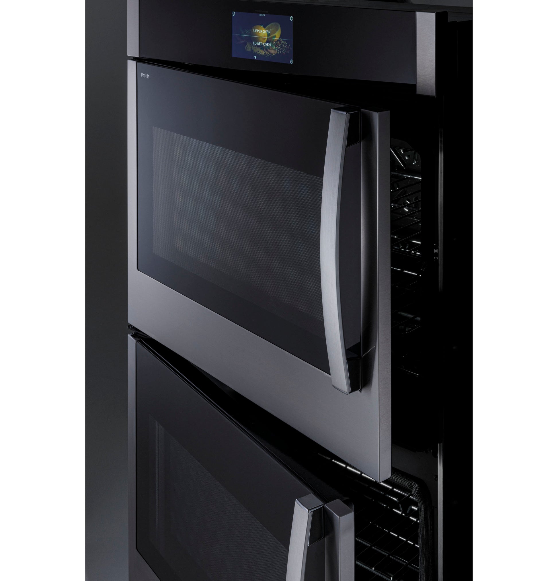 Black built-in convection double wall oven with right-hand side-swing doors in modern kitchen appliance setting