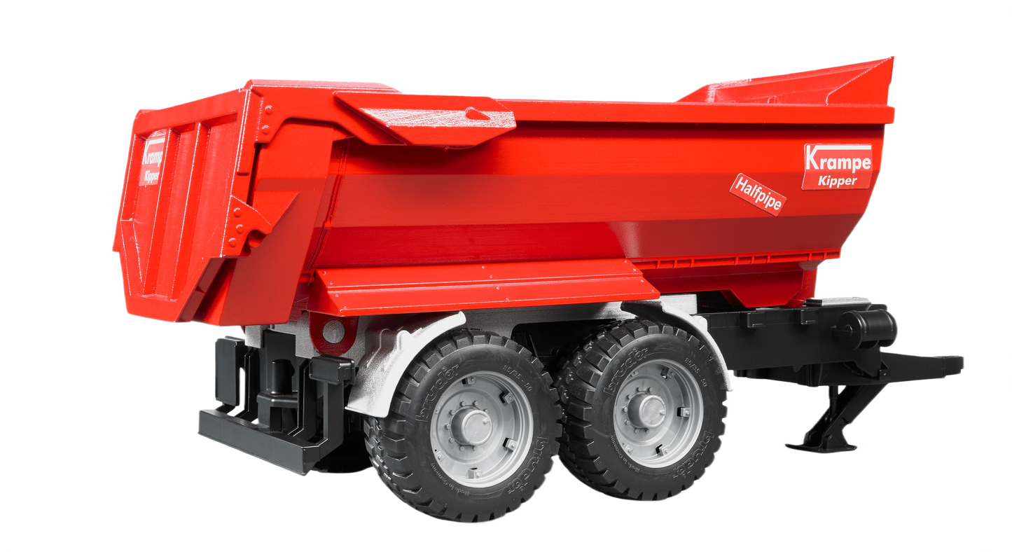 Red toy tandem axle halfpipe tipping trailer with black chassis and detailed wheels for realistic model display or play